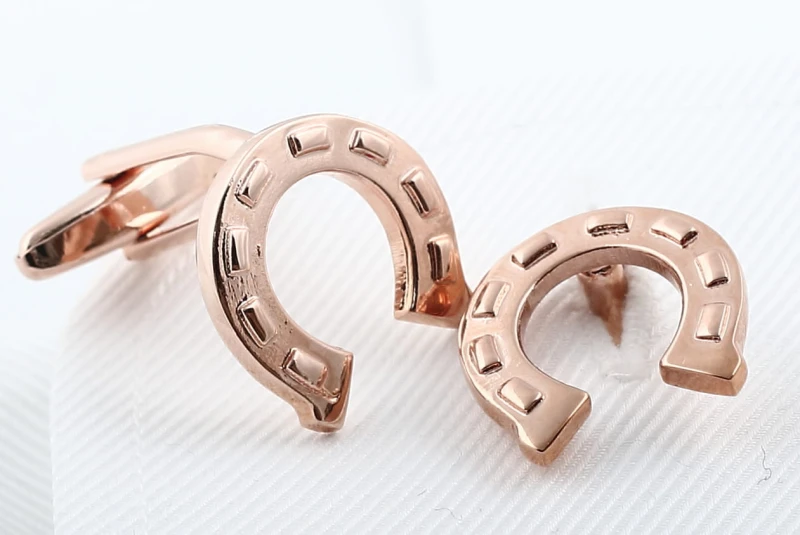 Copper colored cufflinks in the shape of horseshoes SP1514a.jpg