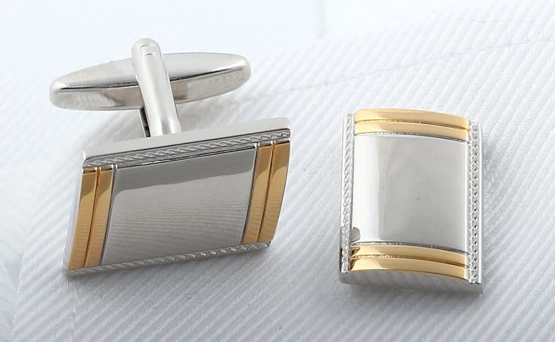 Rectangular cufflinks with diagonal gold and silver stripes
