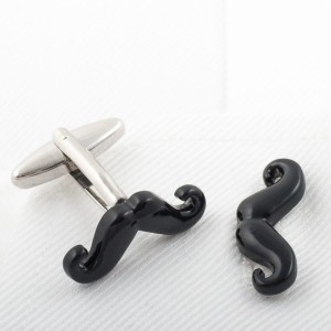 Cufflinks in the shape of mustaches