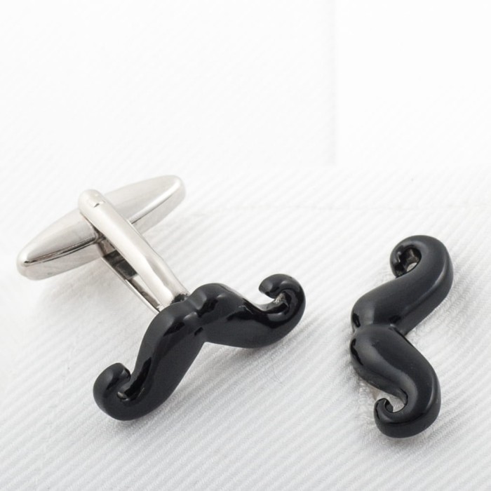 Cufflinks in the shape of mustaches