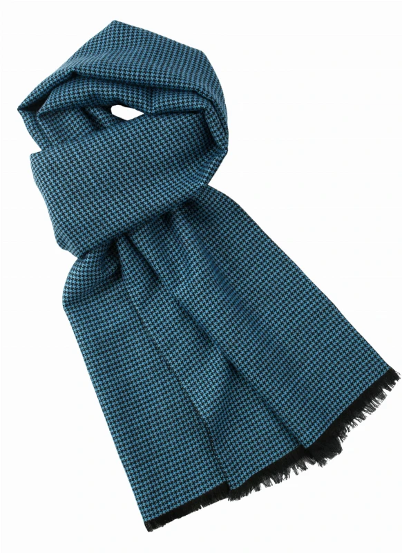 Double-sided men's wool scarf. One side features a blue and black houndstooth pattern, while the other is solid navy blue