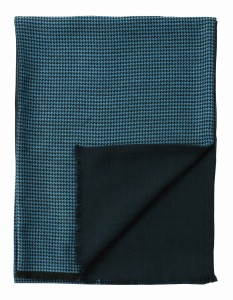 Double-sided men's wool scarf. One side features a blue and black houndstooth pattern, while the other is solid navy blue