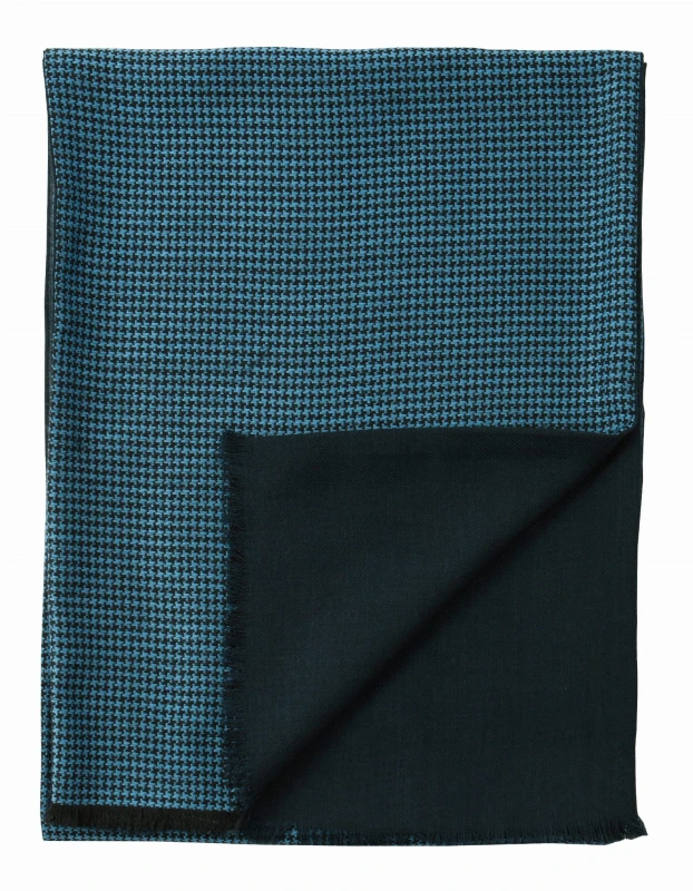 Double-sided men's wool scarf. One side features a blue and black houndstooth pattern, while the other is solid navy blue