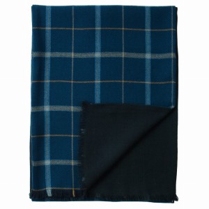 Double-sided dark navy wool scarf in a windowpane check. One side features a checked fabric, while the other side is solid navy blue