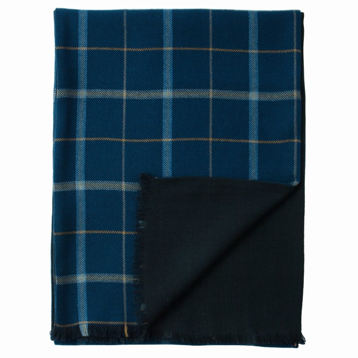 Double-sided dark navy wool scarf in a windowpane check. One side features a checked fabric, while the other side is solid navy blue