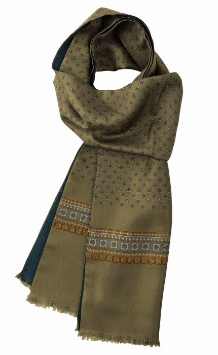 Elegant silk scarf in khaki with a blue and orange geometric pattern. Lined with a soft, navy wool backing and finished with decorative tassels.
