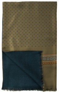 Elegant silk scarf in khaki with a blue and orange geometric pattern. Lined with a soft, navy wool backing and finished with decorative tassels