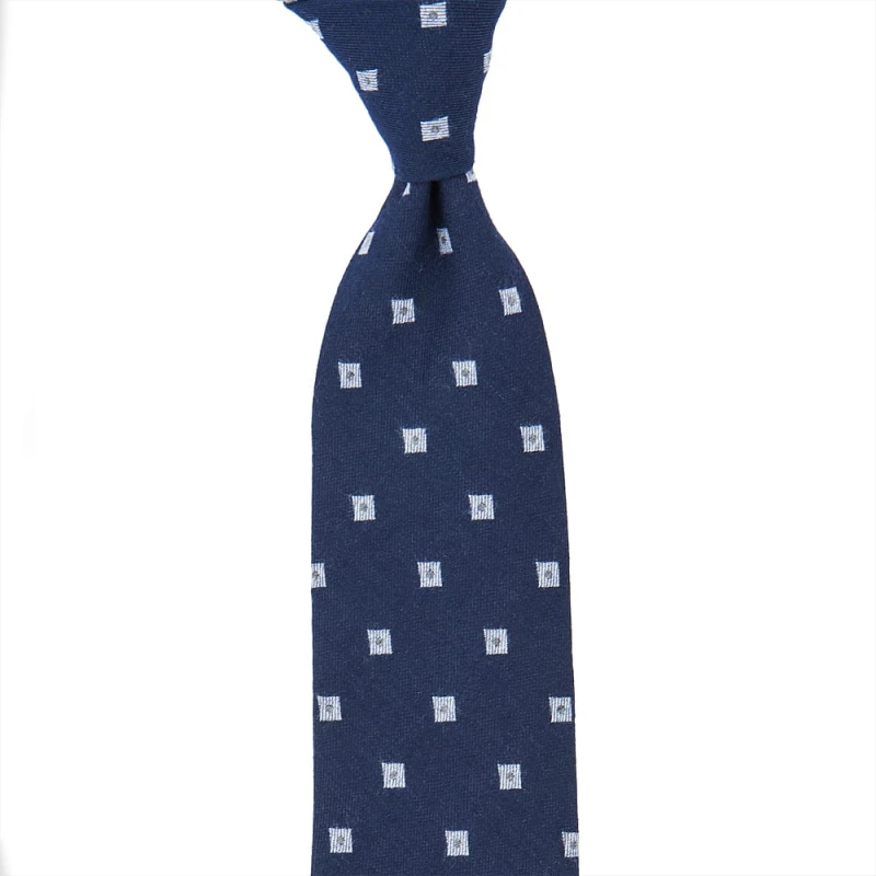 Silk and wool navy blue tie with white squares
