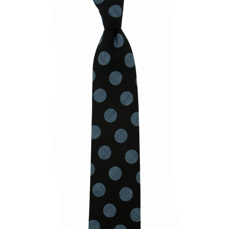 Black tie with large blue polka dots