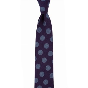 Purple tie with large blue polka dots