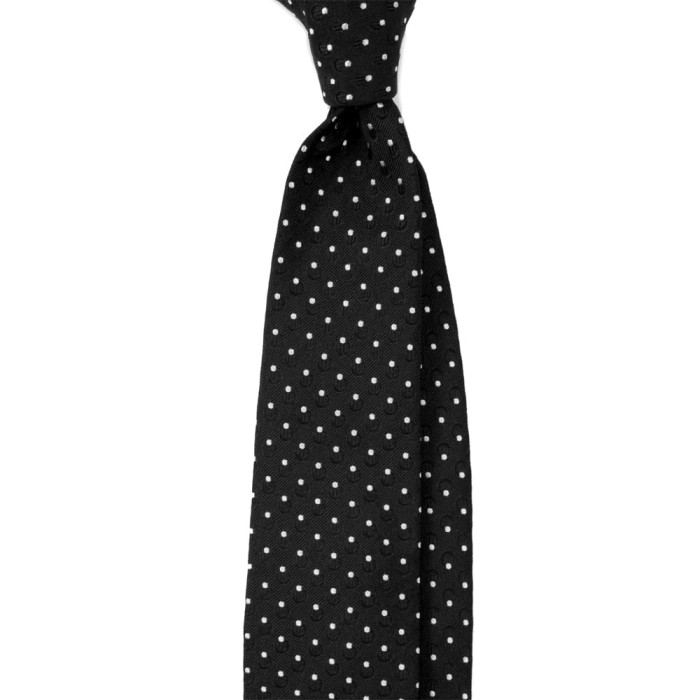 Black silk tie with white polka dots