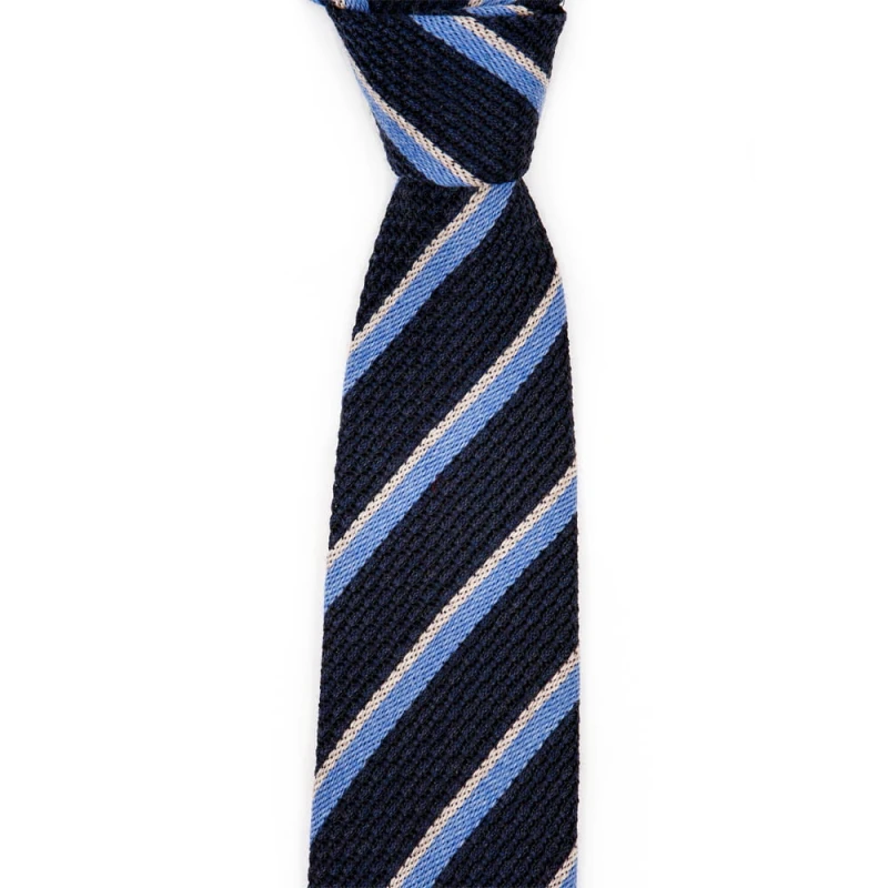 Dark navy blue grenadine tie with blue and white stripes
