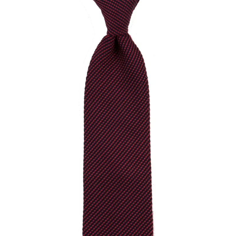 Red silk grenadine tie interspersed with a navy blue thread