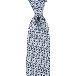 Navy blue and white silk tie with small pattern