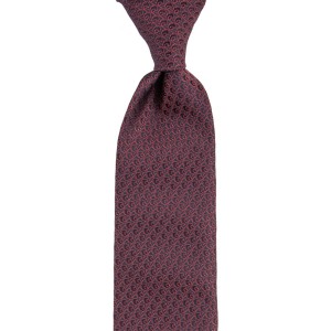 Navy blue silk tie with a red pattern