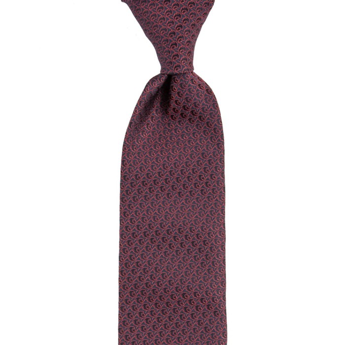 Navy blue silk tie with a red pattern