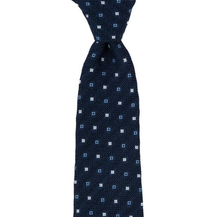 Navy blue grenadine tie with blue and white squares