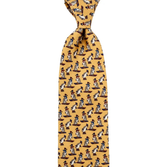 Gold silk tie with penguins on skis
