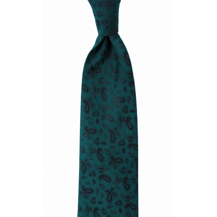 Jacquard silk in sea color with navy blue paisley pattern