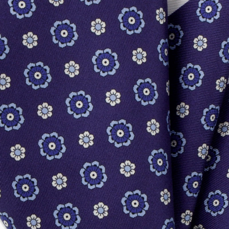 Purple silk pocket square with blue and white flowers
