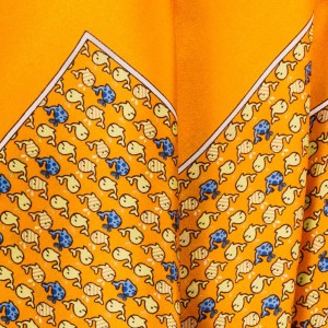 Orange silk pocket square with fish pattern