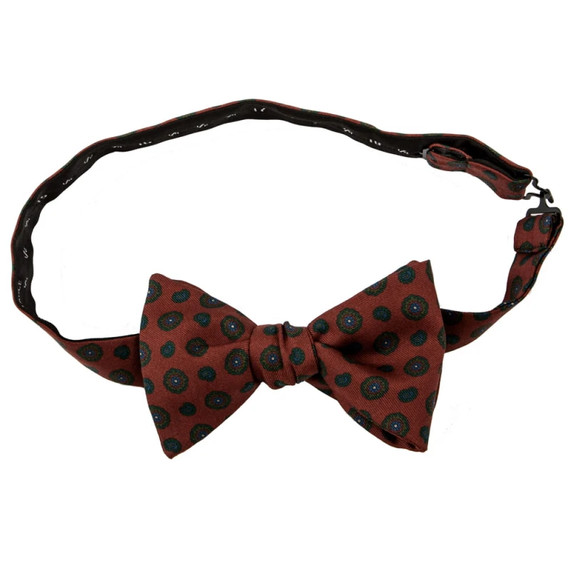 Burgundy silk bow tie with green medallions