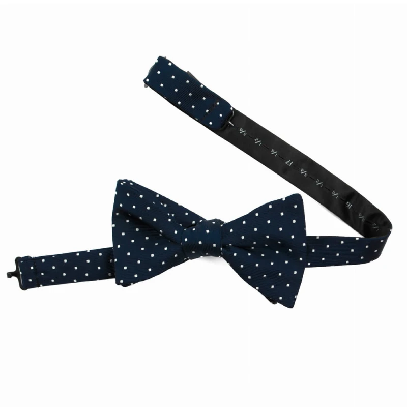 Silk jacquard bow tie in navy blue with a polka dot pattern