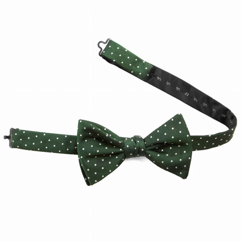 Silk jacquard bow tie in green with a polka dot pattern
