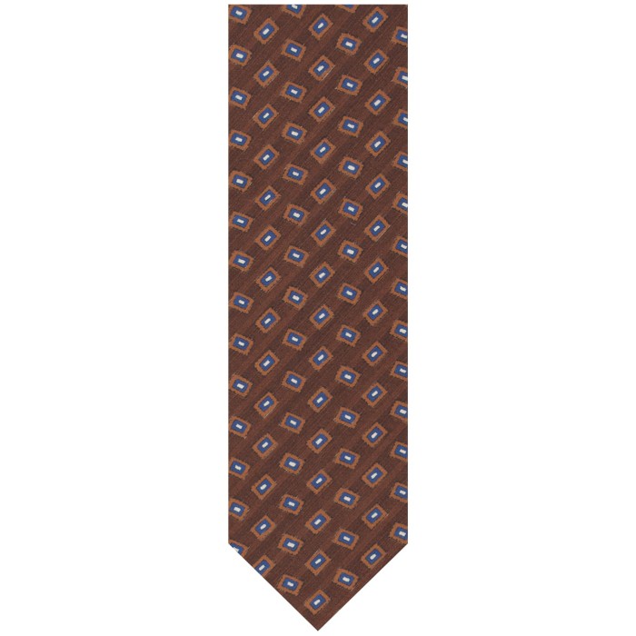 Brown silk tie featuring a geometric pattern in brown, navy, and white tones