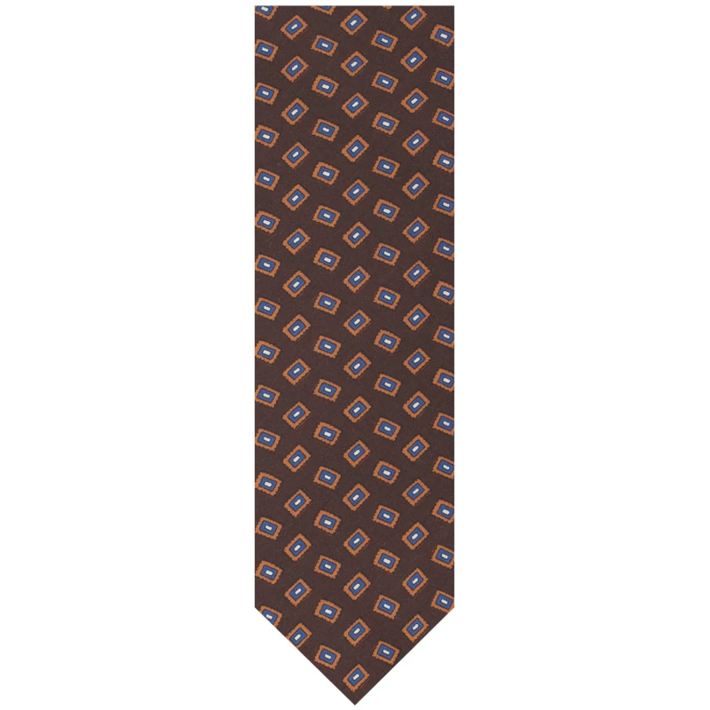 Dark brown silk tie with a geometric pattern in shades of brown, navy, and white