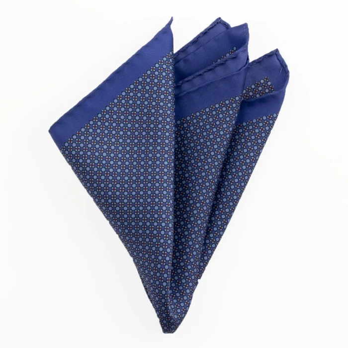 Printed silk pocket square with a fine geometric pattern - blue, folded into a point