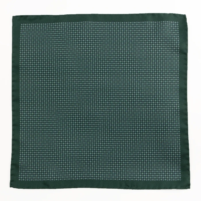 Green silk pocket square with a fine geometric pattern, flat view