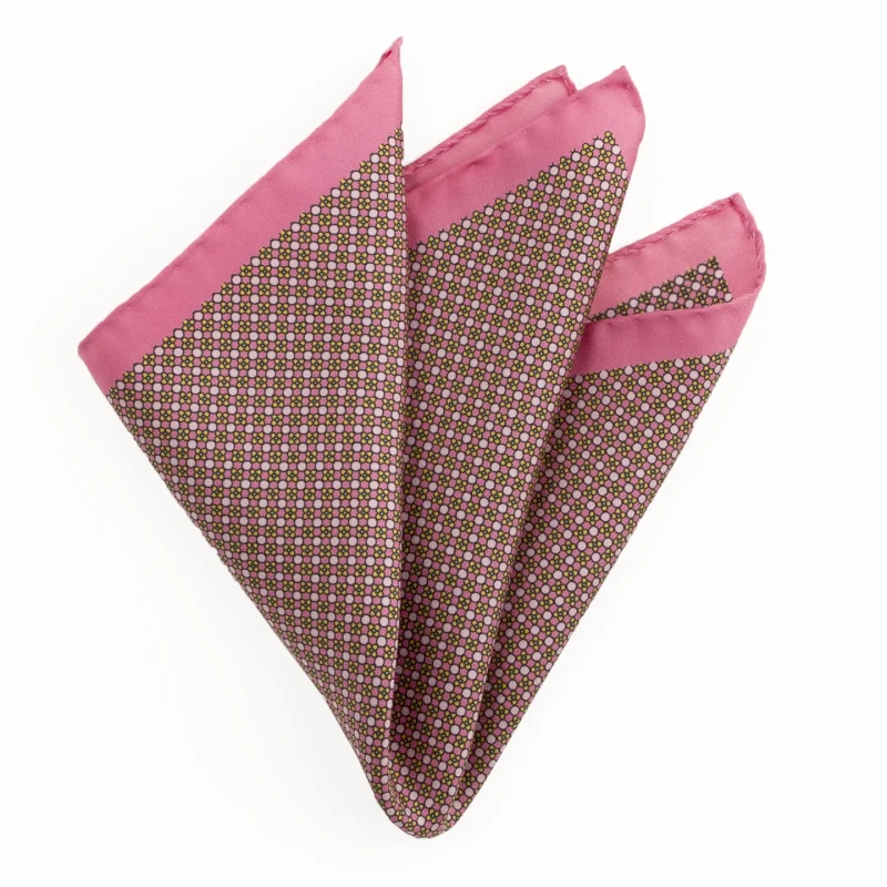 Printed silk pocket square with a fine geometric pattern - pink, folded into a point