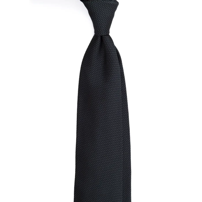 A knotted graphite-coloured silk jacquard tie with a fine weave