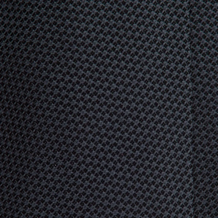 A close-up of a graphite-coloured silk jacquard tie with a fine weave