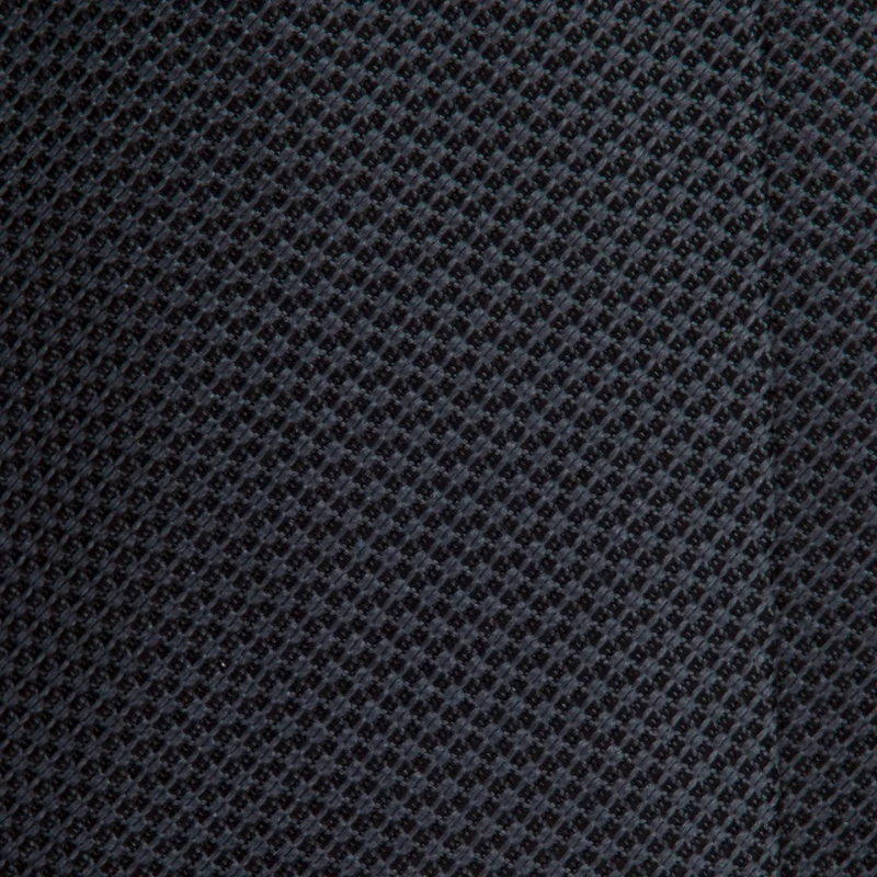 A close-up of a graphite-coloured silk jacquard tie with a fine weave