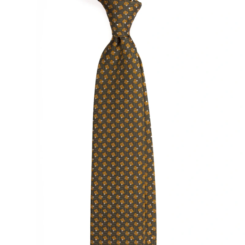 An olive silk jacquard tie with a small geometric pattern, tied in a knot