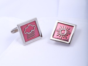 Pink cufflinks with cloud and sun