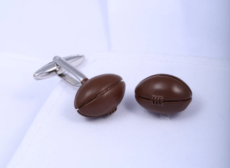 Brown rugby-shaped ball cufflinks