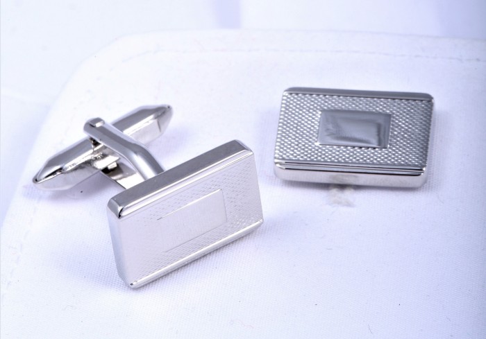 Rectangular cufflinks with a varied texture