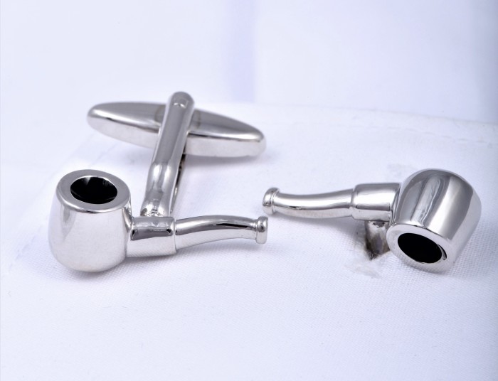 Cufflinks in the shape of pipes