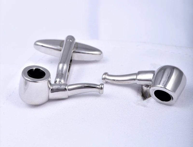 Cufflinks in the shape of pipes