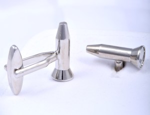 Cufflinks in the shape of bullets
